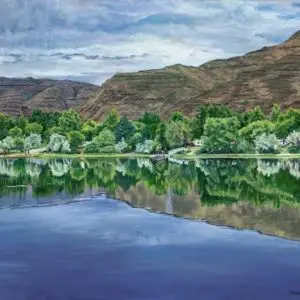 Painting of deep blue river, green trees and brown hillss and