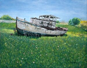 Blue and white boat named Edith-E in a field of grasses and flowering ice plants