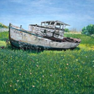 Blue and white boat named Edith-E in a field of grasses and flowering ice plants